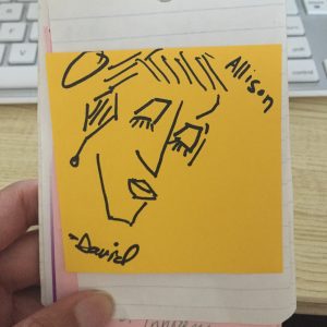 line drawing of a woman in marker on a sticky note